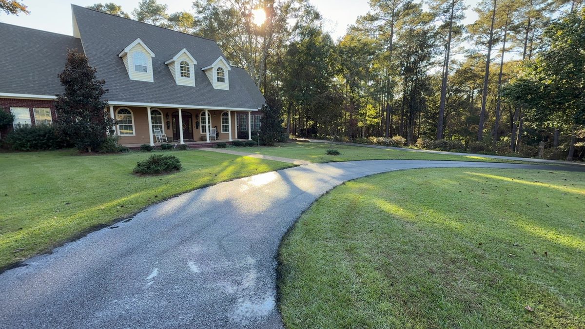 Sealed residential driveway and front yard