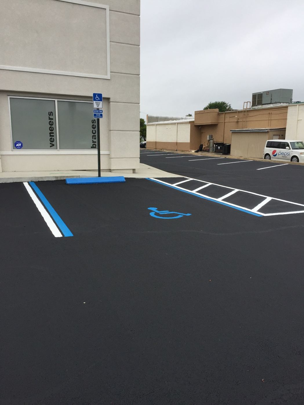 Fresh handicap space and stall striping